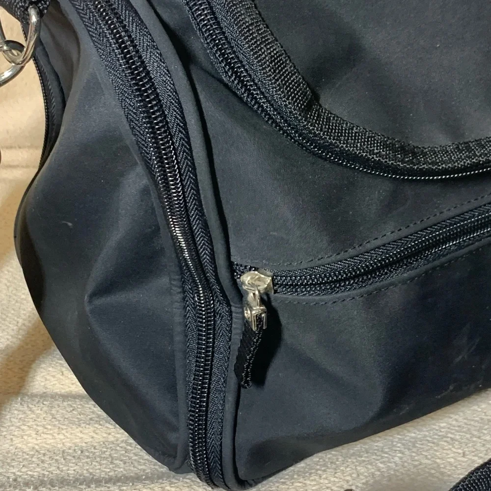 black travel bag for make up or toiletries